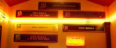 The colorful entrance to Tony Roma's featuring Zoobilee signs.